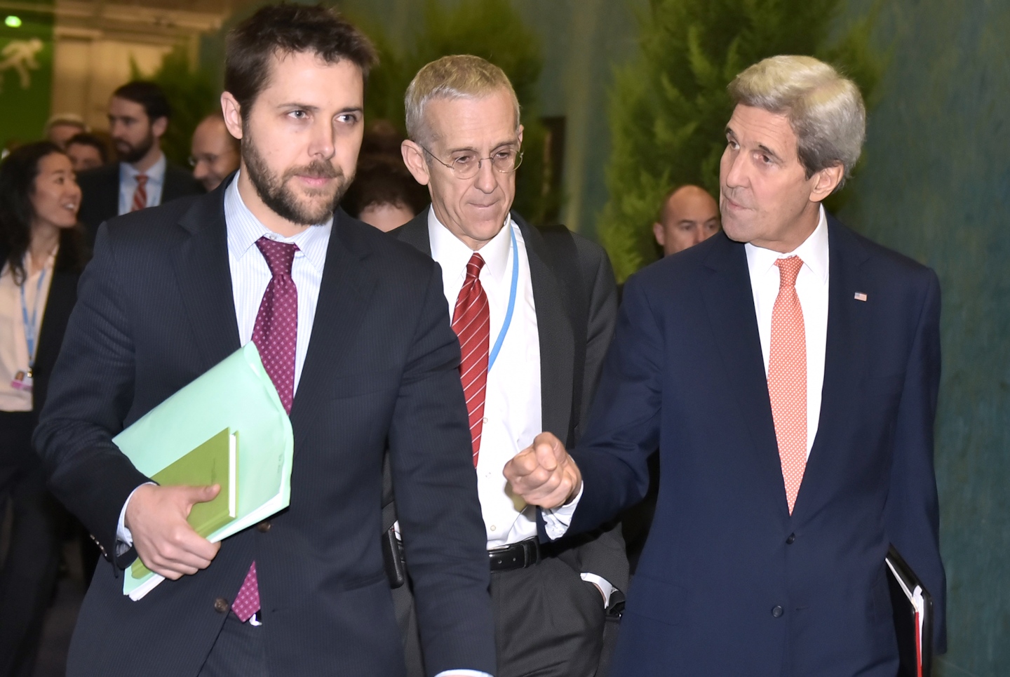 US Secretary of State John Kerry, right, walks with White House senior advisor Brian Deese, left, and US Special Envoy for Climate Change Todd Stern, centre, to attend a meeting with French Foreign Minister Laurent Fabius during the COP 21 United Nations conference on climate change at Le Bourget, on the outskirts of Paris, on Thursday Dec. 10, 2015. (Mandel Ngan Pool via AP)
