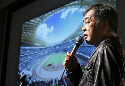 Japanese architect Kengo Kuma speaks during a press conference after his design for the 2020 Tokyo Olympic stadium was picked. (AP Photo/Shizuo Kambayashi)