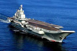 The Liaoning, China's first aircraft carrier, sails in the sea near Qingdao in eastern China's Shandong province. (Chinatopix via AP)