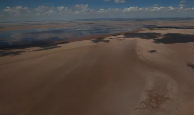This Jan. 16, 2016 aerial photo shows a view of Lake Poopo, Bolivia, high on Bolivia’s semi-arid Andean plains at 3,700 meters (2.3 miles). (AP Photo/Juan Karita)