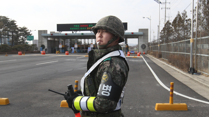 A South Korea Army soldier stands guard at the customs, immigration and quarantine office near the border village of Panmunjom, in Paju, South Korea, Thursday, Feb. 11, 2016. (AP Photo/Ahn Young-joon)