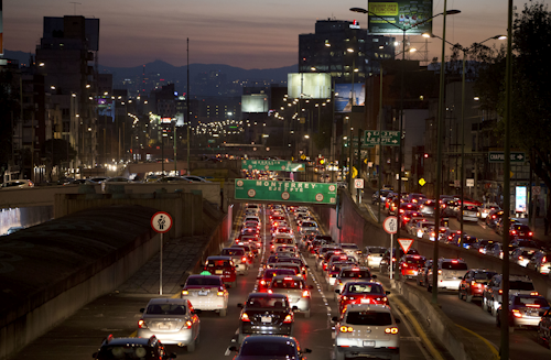 Cars sit in evening rush hour traffic in Mexico City, Wednesday, March 30, 2016. Metropolitan authorities on Wednesday temporarily ordered all cars to remain idle one day a week in response to this notoriously smoggy capital's worst air-quality crisis in over a decade. (AP Photo/Rebecca Blackwell)
