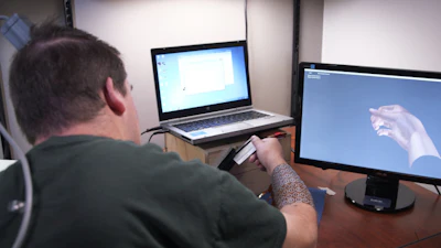 Ian Burkhart, 24, never thought he would sweep a credit card again. “Burkhart was paralyzed from the shoulders down after a diving accident in 2010, but regained functional use of his hand through the use of neural bypass technology.” (Image credit: The Ohio State University Wexner Medical Center via GE Reports)