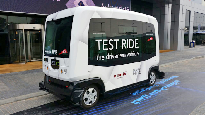 In this photo made available by Dubai Road and Transport Authorities, RTA, a 10-seater driverless car is being test run during the second Middle East and North Africa, MENA, Transport Congress Exhibition in Dubai, United Arab Emirates. (RTA Photo via AP)