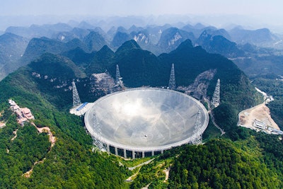 China has begun operating the world's largest radio telescope to help search for extraterrestrial life. (Liu Xu/Xinhua via AP)