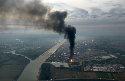 A huge cloud of dark smoke seen at the BASF chemical plant site in Ludwigshafen, Germany, Monday Oct. 17, 2016. The company said that several people were injured in a late-morning explosion. ( Ulli Ziegenfuss/dpa via AP)