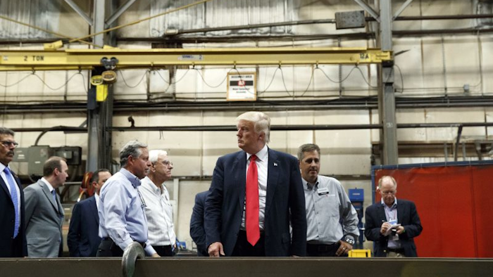 Donald Trump campaigns at a Pennsylvania manufacturing company in August (AP Photo)