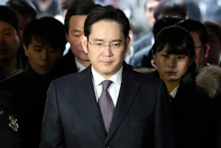 In this Jan. 18, 2017, file photo, Lee Jae-yong, front, a vice chairman of Samsung Electronics Co. arrives for the hearing at the Seoul Central District Court in Seoul, South Korea. South Korean prosecutors say they will indict Lee on bribery, embezzlement and other charges linked to a political scandal that has toppled President Park Geun-hye. (AP Photo/Lee Jin-man, File)