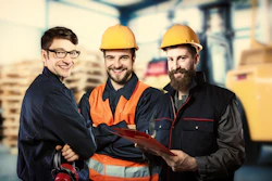 Smiling Workers In Front Of Forklift 505531350 2131x1411 58c7d8712a3f7