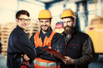 Smiling Workers In Front Of Forklift 505531350 2131x1411 58c7d8712a3f7