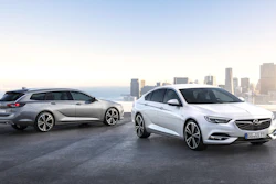 This undated image provided by car manufacturer Opel AG, shows a Opel Insignia Grand Sport, right, and the Insignia Sports Tourer station wagon. (Adam Opel AG via AP)