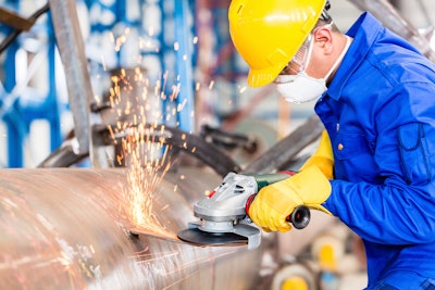 Metal Worker In Factory Grinding Metal Of Pipeline 000058892894 Xxx Large 590202e5df94e