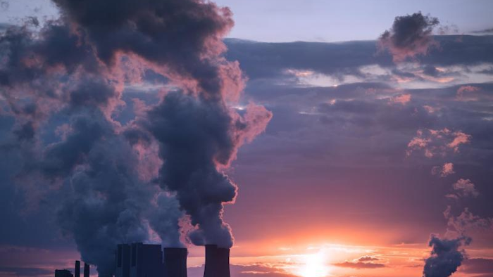 In this April 27, 2017 file photo smoke billows out of the chimneys of the Neurath lignite power plant in Neurath. Germany. World leaders affirmed their commitment Thursday, June 1, 2017 to combating climate change ahead of U.S. President Donald Trump’s announcement on whether he would pull out of the Paris climate accord. Trump is expected to announce his decision on Thursday afternoon. (Federico Gambarini/dpa via AP,file)