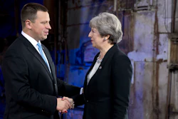 British Prime Minister Theresa May, right, is greeted by Estonian Prime Minister Juri Ratas during arrivals for an EU Digital Summit in Tallinn, Estonia on Friday, Sept. 29, 2017. The European Union is looking beyond its impending breakup with Britain at how to build a common future with the 27 nations remaining in the bloc. (AP Photo/Virginia Mayo)
