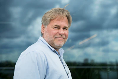 In this July 1, 2017, file photo, Eugene Kaspersky, Russian antivirus programs developer and chief executive of Russia's Kaspersky Lab, poses for a photo on a balcony at his company's headquarters in Moscow, Russia. The founder of Russian anti-virus firm Kaspersky tells The Associated Press his company did upload classified U.S. documents a couple of years ago, only to delete them immediately after realizing what had happened. Kaspersky's acknowledgement is the first on-the-record confirmation of an incident described earlier this month in three U.S. newspapers.(AP Photo/Pavel Golovkin, File)