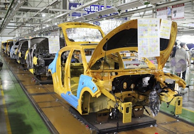 Assembly lines sit idle at the Hyundai Motor factory in Ulsan, South Korea. Hyundai Motor Co. union spokesman Hong Jae-gwan said Tuesday, Nov. 28, 2017, that about 1,950 workers, or 4 percent of its union members, stopped work Monday at a plant in Ulsan, 380 kilometers (236 miles) southeast of Seoul. He said there was no plan to expand the partial strike into a full-blown one. (Lee Sang-hyun/Yonhap via AP, File)