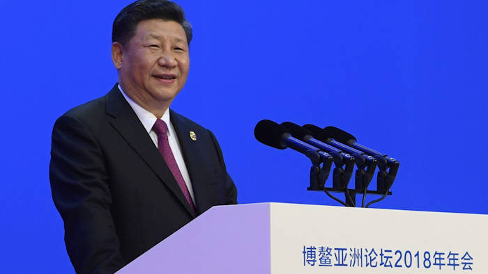 In this photo released by Xinhua News Agency, Chinese President Xi Jinping delivers his opening speech at the Boao Forum for Asia Annual Conference in Boao in south China's Hainan province, Tuesday, April 10, 2018. Image credit: Li Xueren/Xinhua via AP