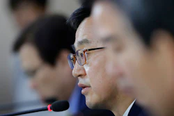 South Korean Finance Minister Kim Dong-yeon speaks to the media during a briefing at the government complex in Seoul, South Korea, Thursday, May 10, 2018. Image credit: AP Photo/Lee Jin-man