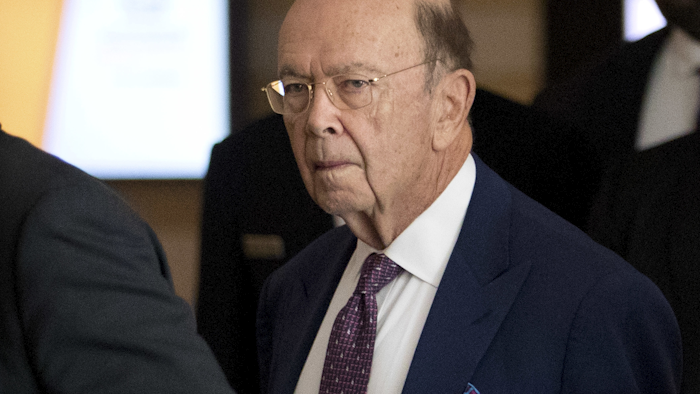In this May 4, 2018, file photo, U.S. Commerce Secretary Wilbur Ross leaves his hotel in Beijing. Image credit: AP Photo/Mark Schiefelbein, File