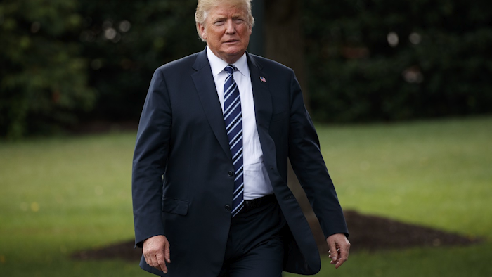 President Donald Trump arrives for a tour during a 'Made in America Product Showcase' at the White House, Monday, July 23, 2018, in Washington. Image credit: AP Photo/Evan Vucci