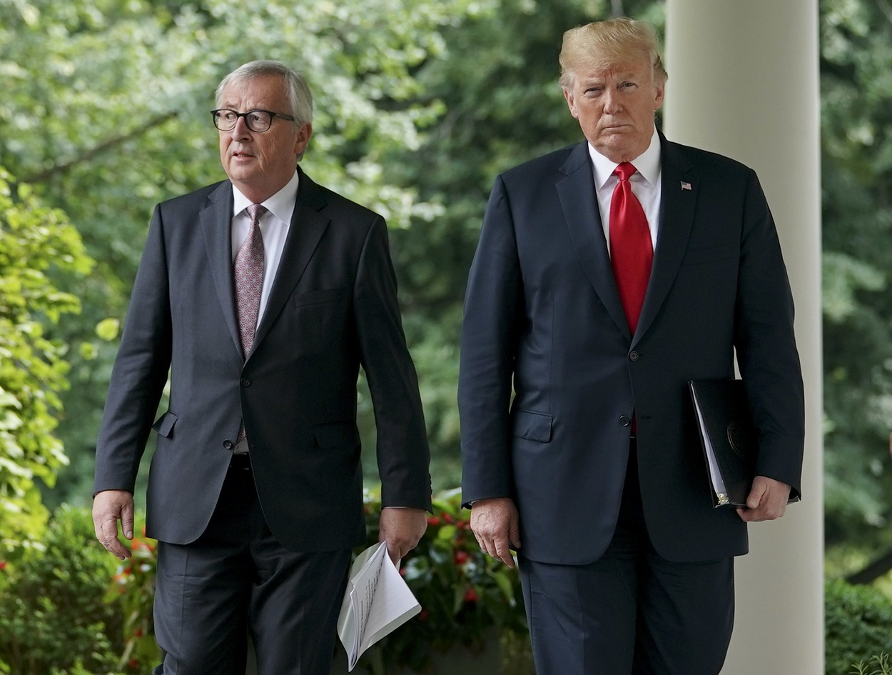 President Donald Trump, right, and European Commission president Jean-Claude Juncker, left, walk from the Oval Office to speak in the Rose Garden of the White House, Wednesday, July 25, 2018, in Washington. Image credit: AP Photo/Pablo Martinez Monsivais
