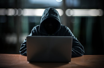 Hacker In Front Of His Computer 583818378 2142x1404