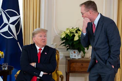 White House chief of staff Mick Mulvaney talks with US President Donald after his meeting with NATO Secretary General Jens Stoltenberg at Winfield House on Tuesday, Dec. 3, in London.