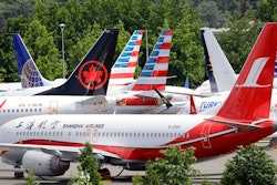 In this Thursday, June 27, 2019 file photo, dozens of grounded Boeing 737 MAX airplanes crowd a parking area adjacent to Boeing Field in Seattle. Safety regulators want to fine Boeing nearly $4 million, saying that the company installed critical wing parts on 133 planes even though it knew the parts were faulty. The Federal Aviation Administration announced the proposed civil penalty on Friday, Dec. 6, 2019.