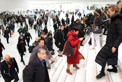 In this Dec. 4, 2019, file photo commuters pass through the World Trade Center in New York. A study by a U.S. agency has found that facial recognition technology often performs unevenly based on a person's race, gender or age. This is the first time the National Institute of Standards and Technology has investigated demographic differences in how face-scanning algorithms are able to identify people.