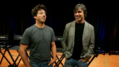 In this Sept. 2, 2008, file photo Google co-founders Sergey Brin, left, and Larry Page talk about the new Google Browser, 'Chrome,' during a news conference at Google Inc. headquarters in Mountain View, Calif. Page and Brin are stepping down from their roles within the parent company, Alphabet. Page, who had been serving as CEO of Alphabet, and Brin, who had been president of Alphabet, will remain on the board of the company.