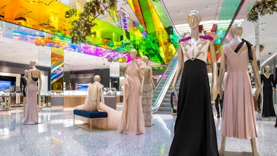 In this Tuesday, Nov. 26, 2019, photo shows a Gucci gown on display in The Vault at the Saks Fifth Avenue Flagship in New York. Millennials and Generation Z accounted for 47% of luxury consumers in 2018 and for 33% of all luxury sales worldwide in 2018, according to a study by consulting firm Bain & Co. Together, however, they contributed to virtually all of the market's growth, compared with 85% in 2017.