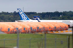 In this Oct. 3, 2019, file photo, completed Boeing 737 MAX fuselages, made at Spirit Aerosystems in Wichita, Kan., sit covered in tarps near the factory. Kansas Gov. Laura Kelly says that the state may have to help pay workers at aircraft parts maker Spirit AeroSystems to keep them on the assembly line if the Boeing 737 Max stays grounded much longer.