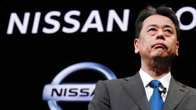 In this Dec. 2, 2019, file photo, Nissan Chief Executive Makoto Uchida speaks during a press conference at the automaker's headquarters in Yokohama, near Tokyo. Japanese securities regulators are recommending that automaker Nissan be fined 2.4 billion yen ($22 million) for the under-reporting of compensation of its former chairman, Carlos Ghosn. The Securities and Exchange Surveillance Commission said Tuesday, Dec. 10, 2019, it made the recommendation to the government's Financial Services Agency.