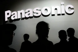 -In this Jan. 9, 2018, file photo, people walk by the Panasonic booth during CES International in Las Vegas. Japanese electronics manufacturer Panasonic Corp. is abandoning the semiconductor business with the sale of its last business in that sector to a Taiwanese company. Panasonic said Thursday it was transferring the semiconductor business operated by Panasonic Semiconductor Solutions Co. to Nuvoton Technology Corp.
