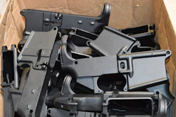 This photo provided by the U.S. Department of Justice shows AR-15 lower receivers, which federal agents have seized, including these unfinished ones taken in 2014 in California, for firearms investigations nationwide. For decades, the federal government has treated the mechanism called the lower receiver as the essential piece of the semiautomatic rifle, which has been used in some of the nation's deadliest mass shootings. But some defense attorneys have recently argued that the part alone does not meet the definition in the law.