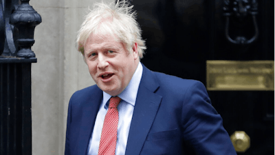 Britain's Prime Minister Boris Johnson leaves 10 Downing Street to attend the weekley session of Prime Ministers Questions in Parliament in London, Wednesday, Jan. 22, 2020.