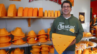 This Jan. 16, 2020 photo taken in Milwaukee shows Ralph Bruno, who invented the yellow wedge cheesehead in 1987 from his mother's couch stuffing. It has since become a symbol of pride, particularly for Wisconsin sports fans and residents. Foamation, Inc. moved into a new location in 2016 and soon started tours where people can make their own cheeseheads or other foam products.