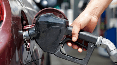 In this Tuesday, June 28, 2016, file photo, a customer puts gas in their vehicle in Miami. Fuel economy standards for new vehicles would rise a little in a new Trump administration proposal made public Thursday, Jan. 23, 2020 but still fall far short of Obama-era standards, bringing howls of protest from environmental groups and a key Democratic senator.