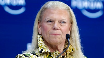 In this Tuesday, Jan. 21, 2020 file photo, Ginni Rometty, President and CEO of IBM, attends a panel discussion at the World Economic Forum in Davos, Switzerland. Ginni Rometty is stepping down after nearly 40 years with the computing giant and eight years at its helm. The company said Thursday, Jan. 30, 2020 that Arvind Krishna will take over as CEO starting April 6 .