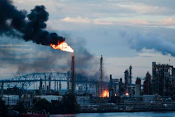 In this June 21, 2019 file photo, flames and smoke emerge from the Philadelphia Energy Solutions Refining Complex in Philadelphia. Federal investigators say an aging, failed elbow pipe appears to be the cause of the June fire and subsequent explosions that left five people with minor injuries and destroyed part of the processing unit at the largest oil refinery on the East Coast.