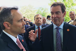 In this April 26, 2107 photo, Braidy Industries Inc. CEO Craig Bouchard, right, and Republican Gov. Matt Bevin speak with reporters in Wurtland, Ky.