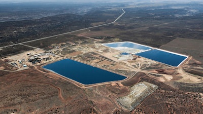 This April 11, 2015, photo provided by EcoFlight shows the White Mesa Uranium Mill near Blanding in southeastern Utah.