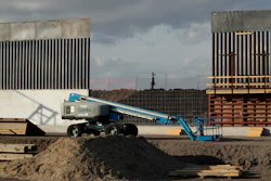 In this Nov. 7, 2019 file photo, the first panels of levee border wall are seen at a construction site along the U.S.-Mexico border, in Donna, Texas.