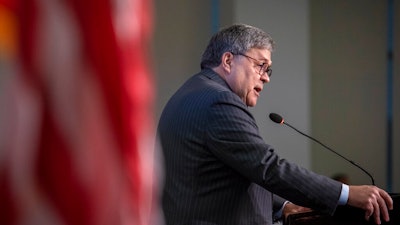 Attorney General William Barr gives the keynote address to the Center for Strategic and International Studies, CSIS China Initiative Conference, Thursday, Feb. 6, 2020, in Washington.
