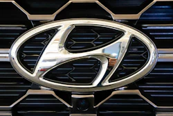 This Feb. 14, 2019 file photo shows the Hyundai logo on a 2019 Hyundai Santa Fe SUV on display at the 2019 Pittsburgh International Auto Show in Pittsburgh. Hyundai is recalling nearly 430,000 small cars because water can get into the antilock brake computer, cause an electrical short and possibly an engine fire. The latest recall covers certain 2006 through 2011 Elantra and 2007 through 2011 Elantra Touring vehicles.