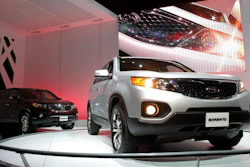 In this Dec. 2, 2009, file photo, the 2011 Kia Sorento debuts at the Los Angeles Auto Show in Los Angeles. Kia is joining its affiliate Hyundai in recalling thousands of vehicles in the U.S. because water can get into a brake computer, cause an electrical short and possibly a fire. The Kia recall covers nearly 229,000 Sedona minivans from the 2006 through 2010 model years. Also covered are Sorento SUVs from 2007 through 2009.