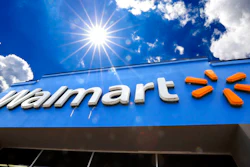 This June 25, 2019, file photo shows the entrance to a Walmart in Pittsburgh. Walmart is reporting disappointing fourth-quarter profits and sales. The nation's largest retailer says that sales at its U.S. stores heading into the holiday season were weaker than expected. It also said that social unrest in Chile hurt its business.