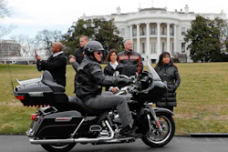 Harley Davidson President and CEO Matthew S. Levatich rides his motorcycle onto the South Lawn of the White House in Washington before a meeting with President Donald Trump and Vice President Mike Pence.