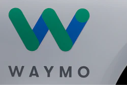 In this May 8, 2018, file photo, a Waymo logo is displayed on the door of a car at the Google I/O conference in Mountain View, Calif.