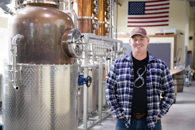Chad Butters, founder of Eight Oaks Farm Distillery, poses for a photo at their facility in New Tripoli, PA on Monday, March 16.